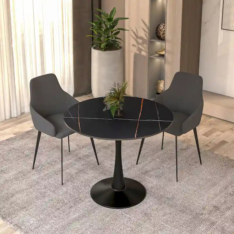 Table à manger ronde avec plateau en pierre frittée et piètement noir