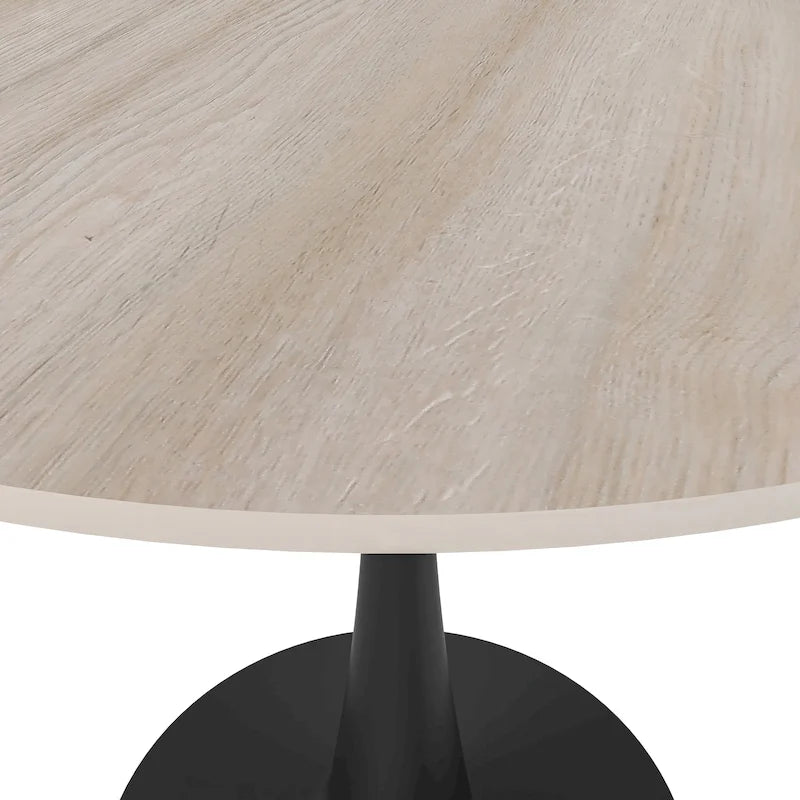 Table à manger ronde avec plateau en pierre frittée et piètement noir