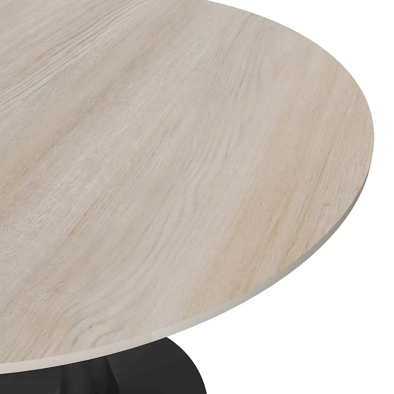 Table à manger ronde avec plateau en pierre frittée et piètement noir
