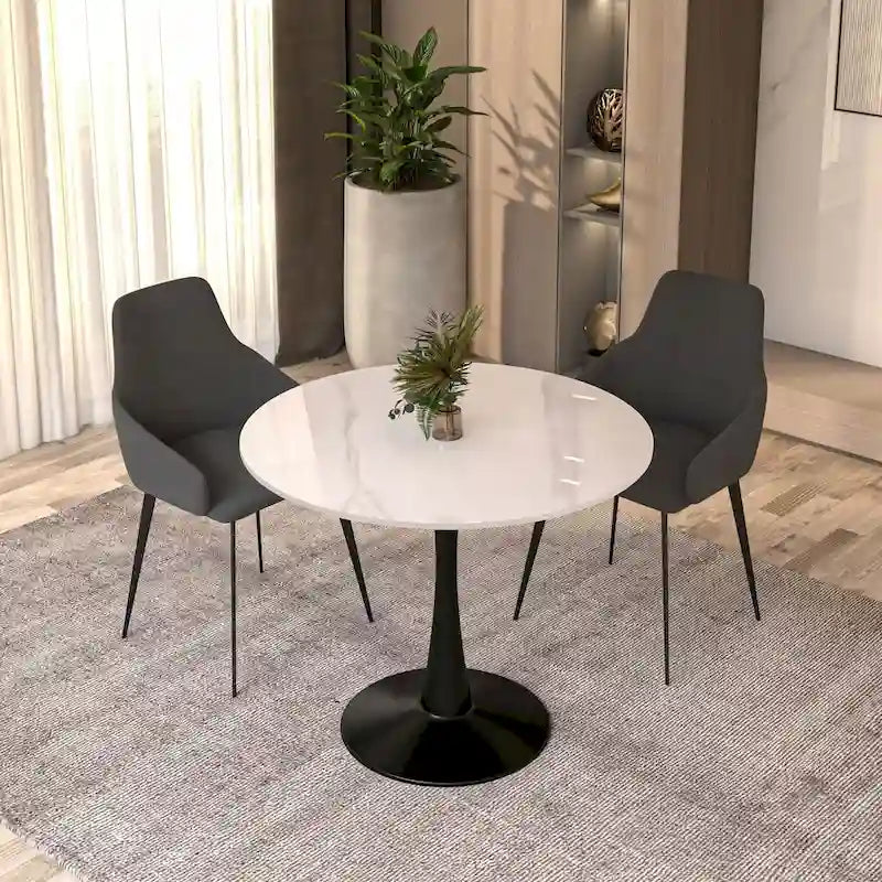 Table à manger ronde avec plateau en pierre frittée et piètement noir